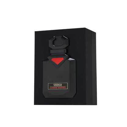 Französischer Avenue Amber Empire Duft von Aladin Fragrances in einer eleganten Flasche, mit goldener Verpackung im Hintergrund.